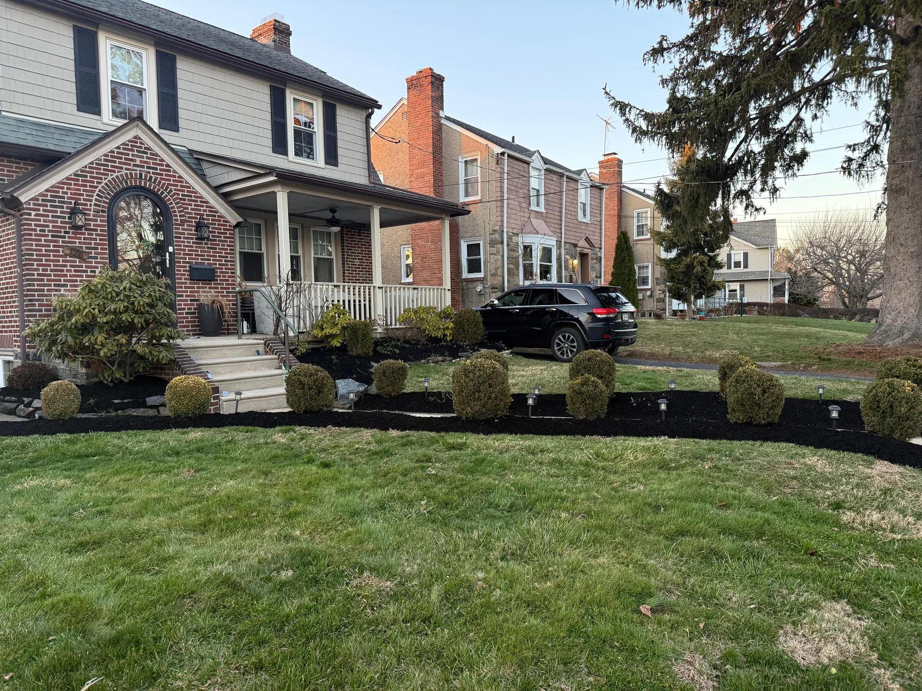 Fresh black mulch installation landscaping beds Delaware County PA by Green Life Landscape Services